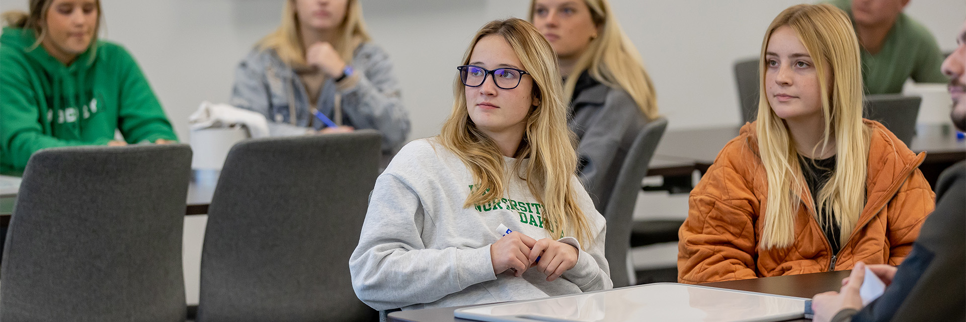 Marketing Students Listening in Class