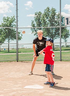 Schaffner coaching tball player